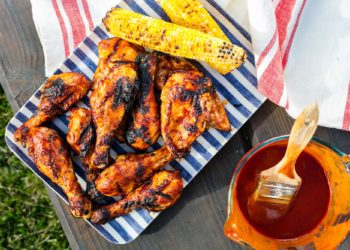 Iron Chefs Bobby Flay and Michael Symon Share Real-World Tips We Can All Use to Heat Up Our Summer BBQs